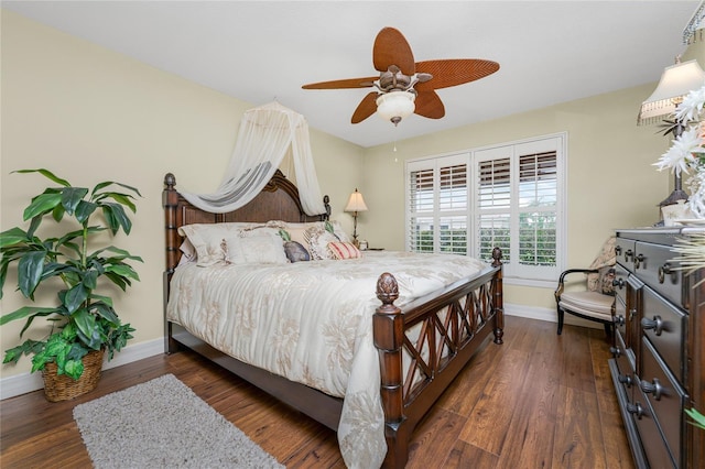 bedroom with dark wood-type flooring and ceiling fan