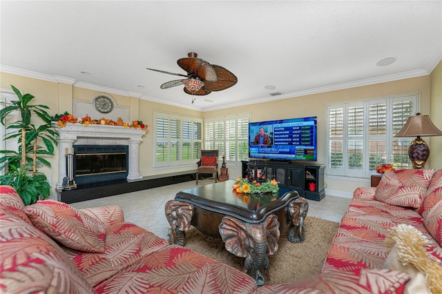 tiled living room with ceiling fan, a wealth of natural light, and ornamental molding