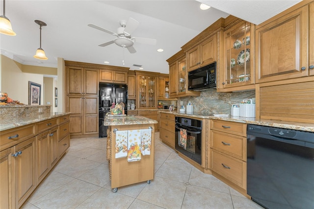 kitchen with a center island, black appliances, light tile patterned floors, backsplash, and pendant lighting