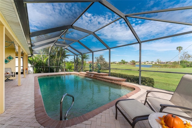 view of pool featuring a patio area and a lanai