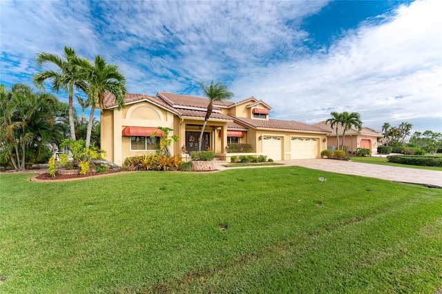 mediterranean / spanish-style home with a front yard