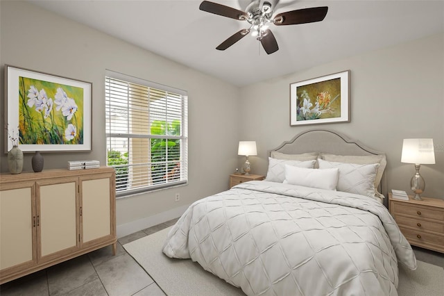 bedroom featuring ceiling fan and light tile patterned floors