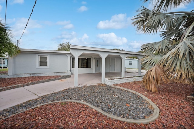 view of front of home with a patio