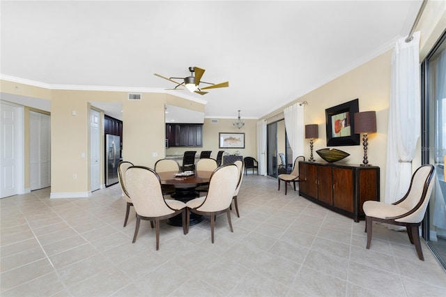 dining space featuring ceiling fan with notable chandelier, light tile patterned floors, and crown molding