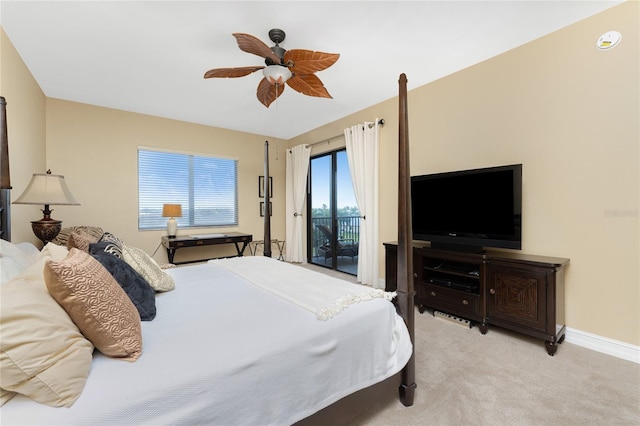 carpeted bedroom with ceiling fan and access to exterior