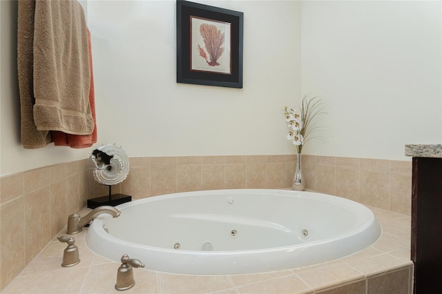 bathroom with tiled tub