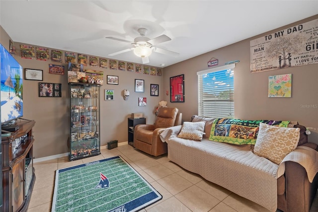 tiled living room with ceiling fan