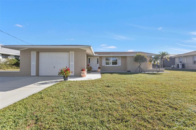 ranch-style home with a front yard and a garage