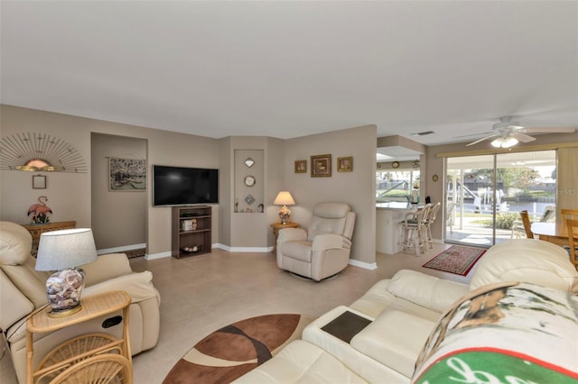 living room featuring ceiling fan