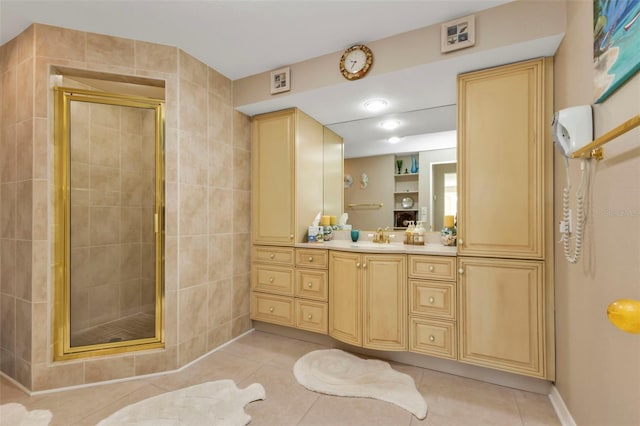 bathroom with tile patterned flooring, an enclosed shower, and tile walls