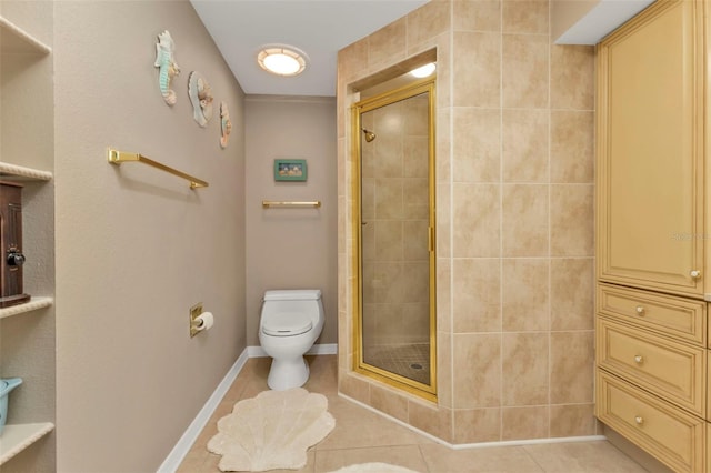 bathroom featuring tile patterned flooring, toilet, and walk in shower