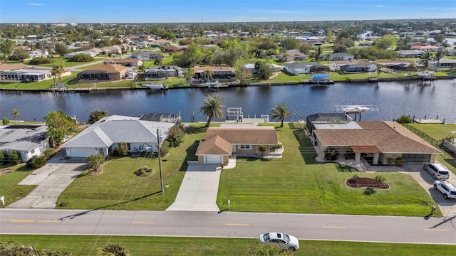 bird's eye view with a water view