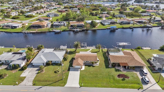 bird's eye view with a water view