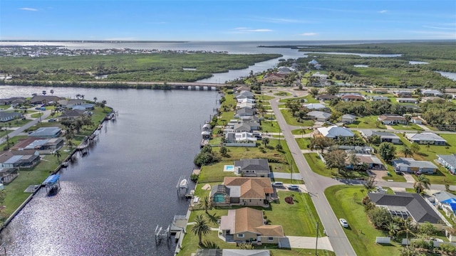 drone / aerial view featuring a water view