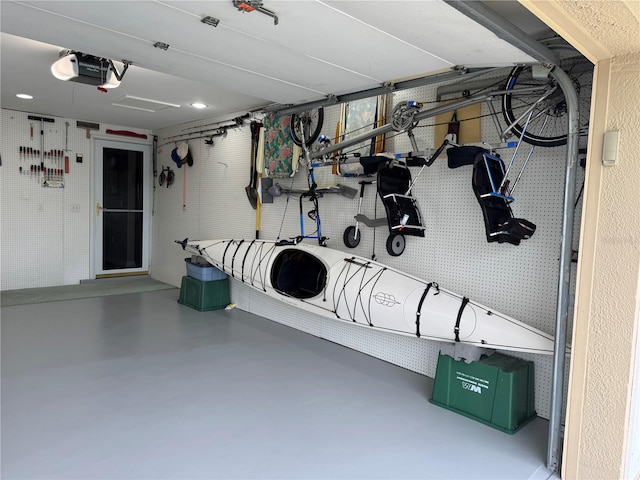 garage featuring a garage door opener