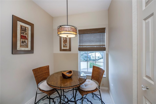 dining area with light wood-type flooring