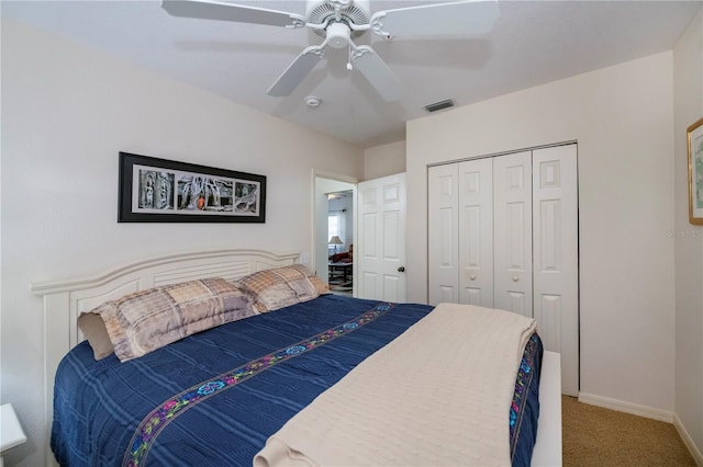 bedroom featuring a closet, ceiling fan, and carpet floors