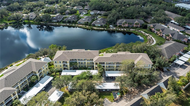 drone / aerial view with a water view