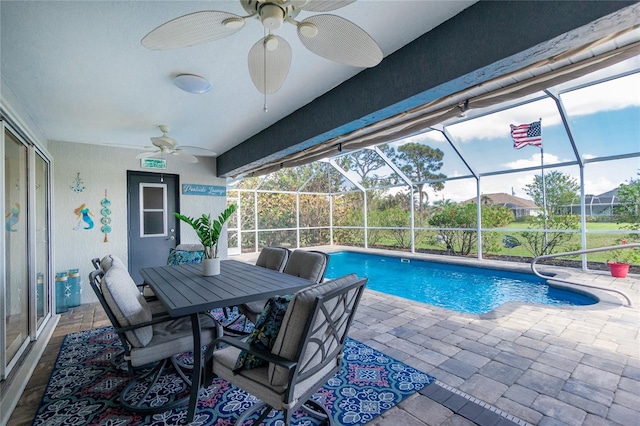 view of pool with a patio area, a lanai, and ceiling fan