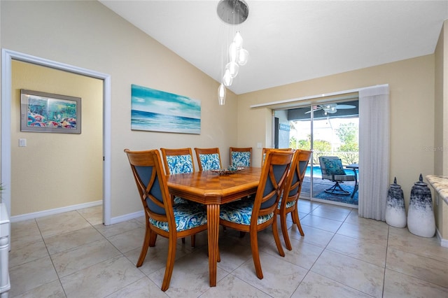 tiled dining area with lofted ceiling