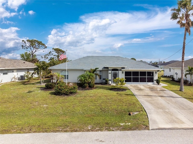 single story home with a front lawn, a sunroom, and central AC