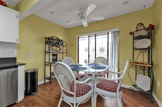 dining space featuring ceiling fan and dark hardwood / wood-style floors