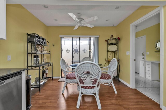 dining area featuring hardwood / wood-style flooring and ceiling fan