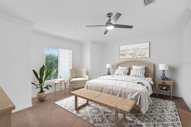 carpeted bedroom featuring ceiling fan and ornamental molding