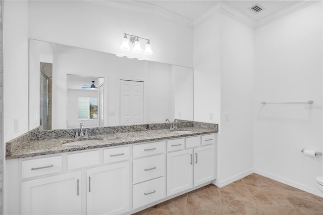 bathroom featuring walk in shower, vanity, ceiling fan, crown molding, and toilet