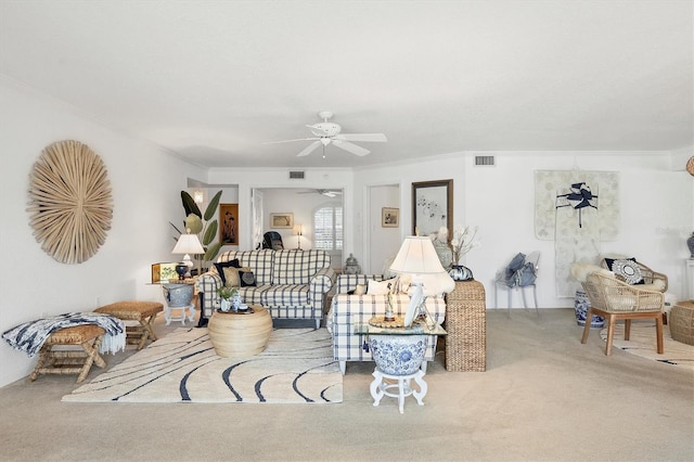 living room featuring light colored carpet and ornamental molding