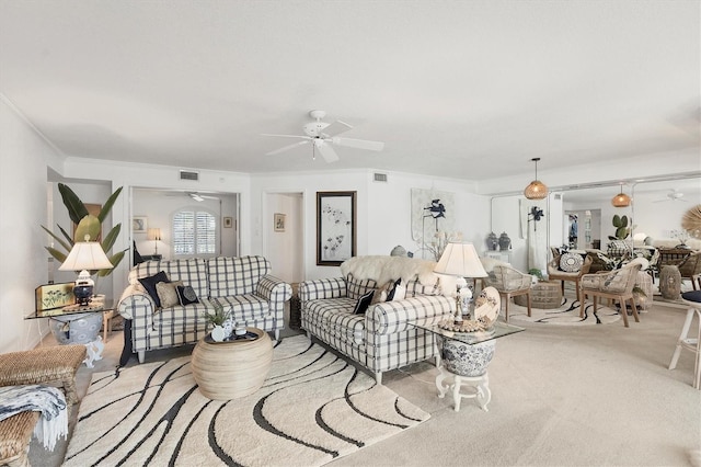 living room with light carpet and crown molding