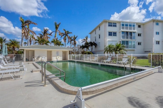 view of swimming pool featuring a patio area