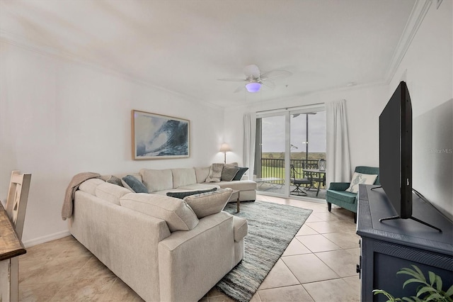 living room with ornamental molding, ceiling fan, and light tile patterned floors