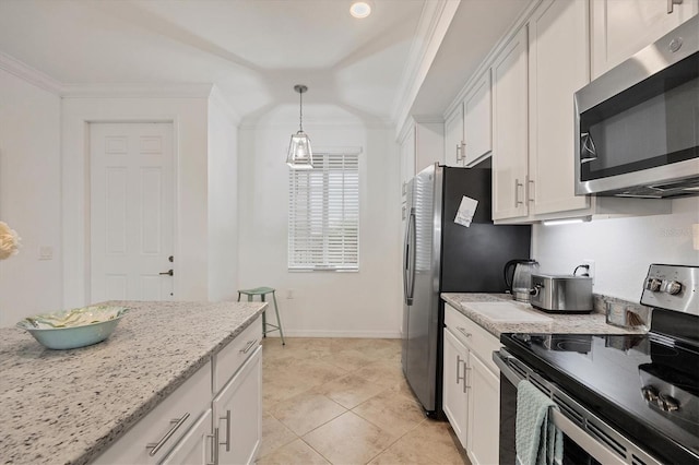 kitchen featuring light stone counters, appliances with stainless steel finishes, ornamental molding, white cabinets, and pendant lighting