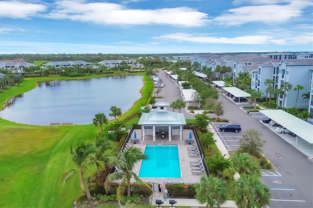 birds eye view of property with a water view