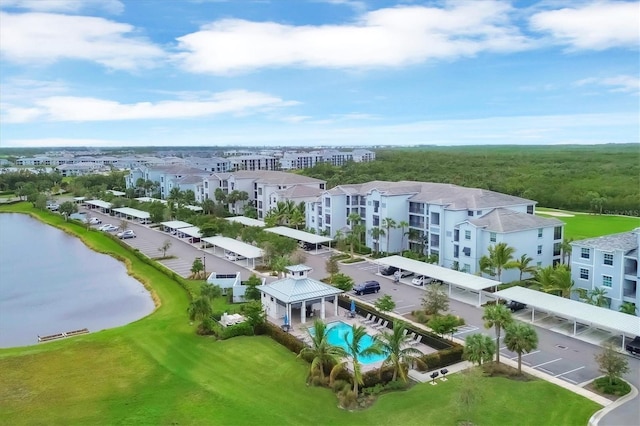 birds eye view of property featuring a water view