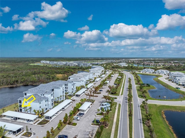 bird's eye view with a water view