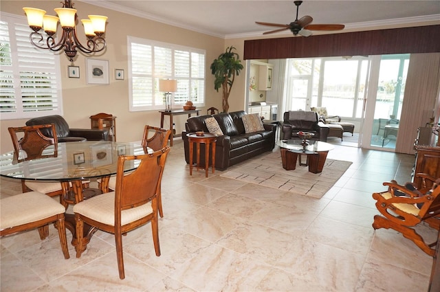 dining space featuring ceiling fan with notable chandelier and crown molding