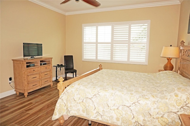 bedroom with wood-type flooring, ceiling fan, and crown molding