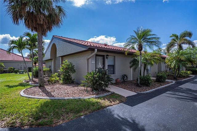 view of property exterior featuring a yard