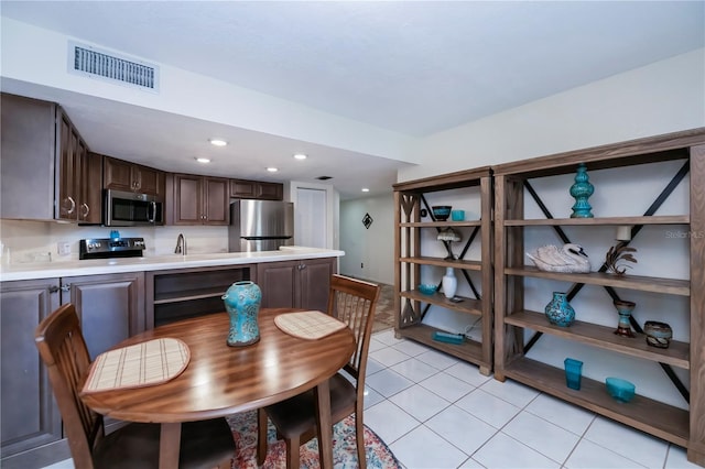 view of tiled dining space