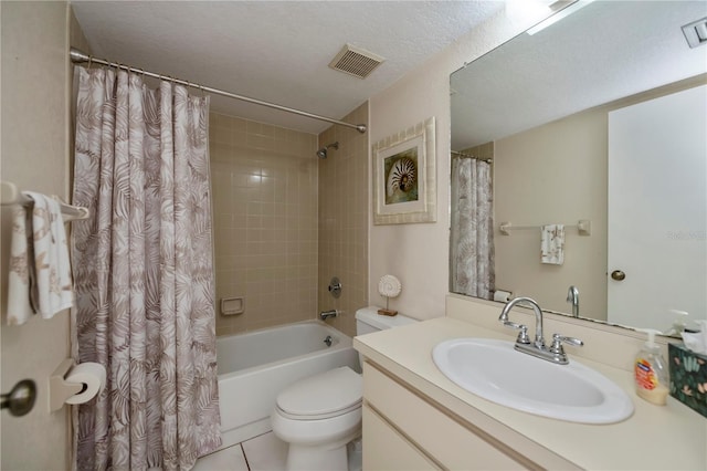 full bathroom with shower / tub combo, a textured ceiling, vanity, tile patterned flooring, and toilet