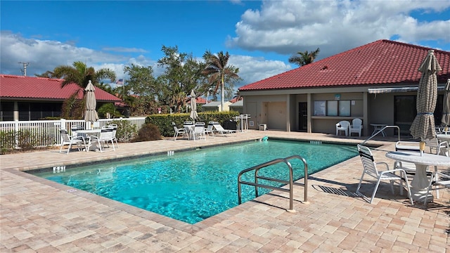 view of swimming pool featuring a patio