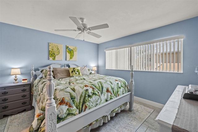 bedroom featuring light wood-type flooring and ceiling fan