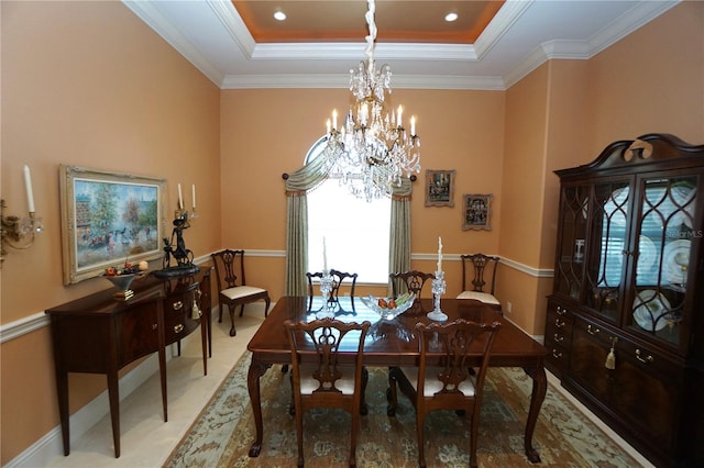 3507 Terin Ct, Punta Gorda, FL 33950 - dining room with a chandelier, a tray ceiling, and crown molding