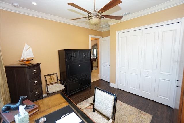 interior space featuring dark hardwood / wood-style flooring, ceiling fan, and ornamental molding