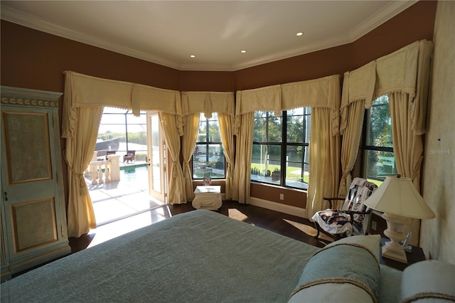 bedroom featuring access to outside, ornamental molding, and hardwood / wood-style flooring