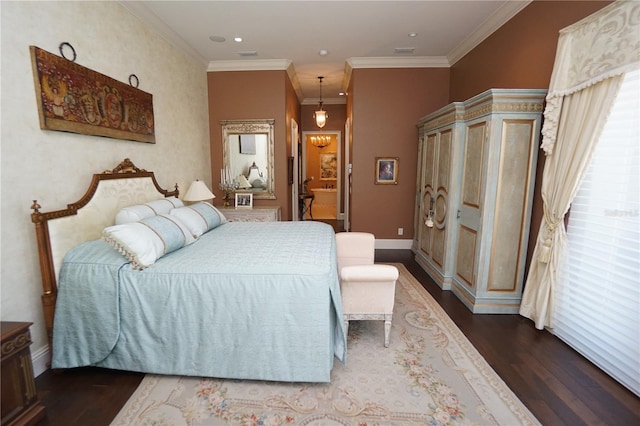 bedroom featuring dark hardwood / wood-style floors and crown molding