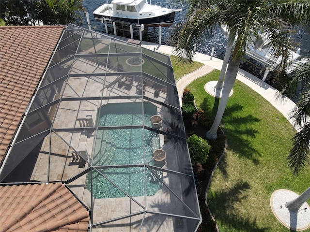 birds eye view of property featuring a water view