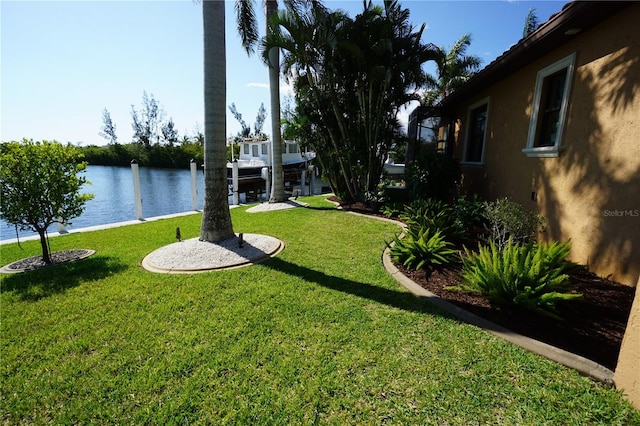 3507 Terin Ct, Punta Gorda, FL 33950 - view of grassy yard with a water view and a boat dock